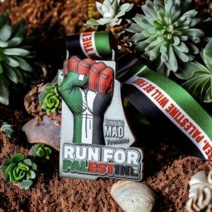 Run for Palestine medal with red fist, green ribbon on blue bokeh background