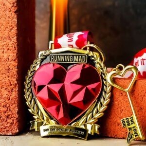 Heart-shaped running medal with love for running inscription