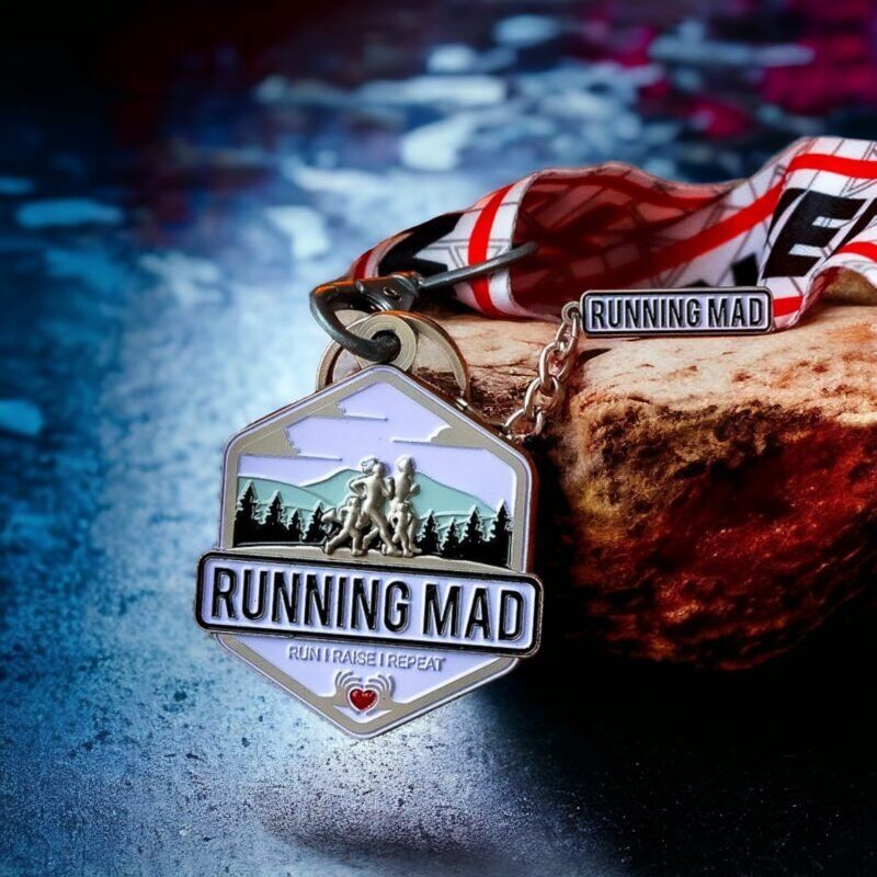 Challenge Your Limits 5k Run with ribbon against rocky backdrop
