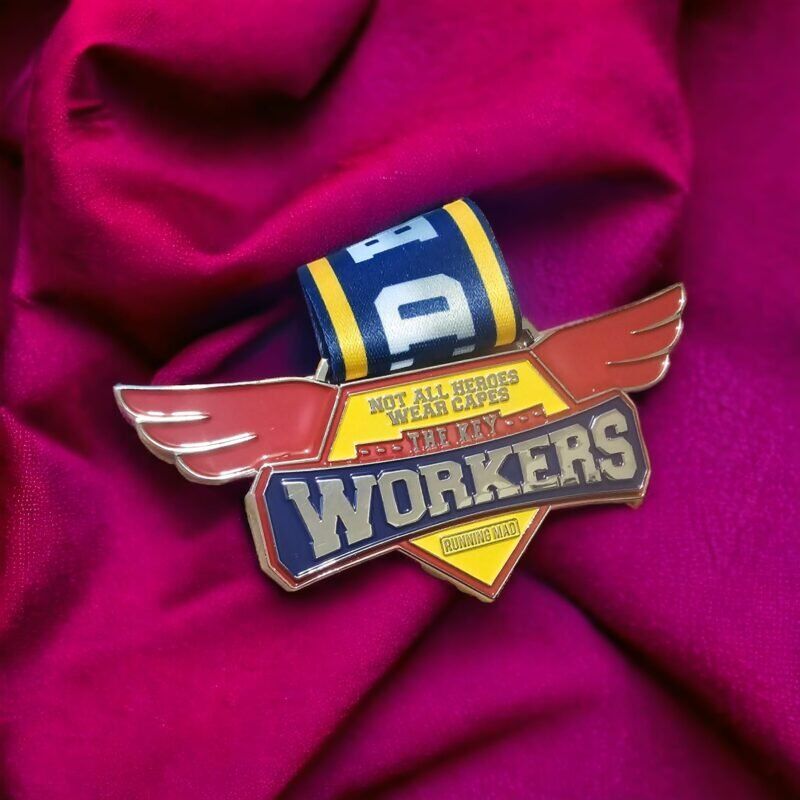 Medal by Running Mad on Maroon Fabric