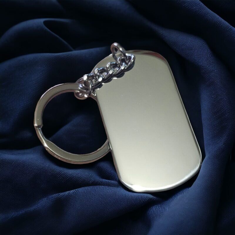 Stainless Steel Silver Keyring on Blue Fabric