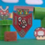 Mario medal from the Super Smash Series celebrating the iconic video game character.