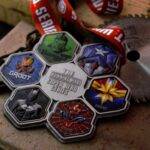 Superhero medals for runners with iconic emblems and characters