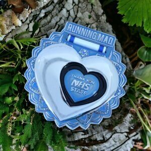 Heartfelt NHS Staff Medal in Natural Outdoor Setting